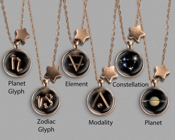 A range of Capricorn zodiac designs set in bronze coloured pendants