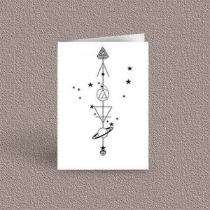 Capricorn represented as a geometric design arrow on a greetings card