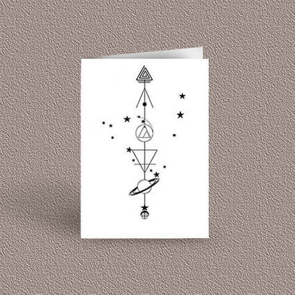 Capricorn represented as a geometric design arrow on a greetings card