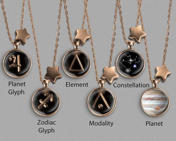 A range of Sagittarius zodiac designs set in bronze coloured pendants